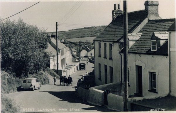 Copy of a photograph looking down Main Street Llangwm Pembrokeshire